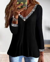 V-ringad långärmadtopp med paljetter